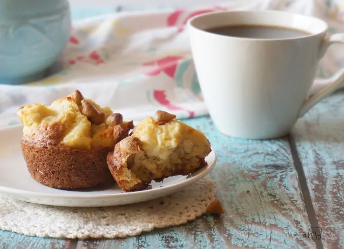Banana French Toast Muffins, soft and moist banana muffins with a fluffy french toast topping and a sprinkle of peanut butter chips. 