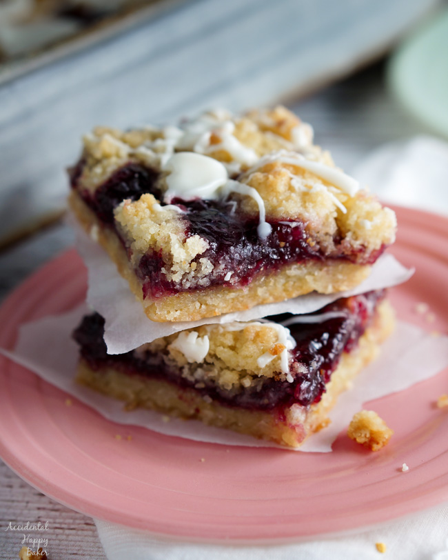 Two Raspberry White Chocolate Shortbread bars sitting on a plate