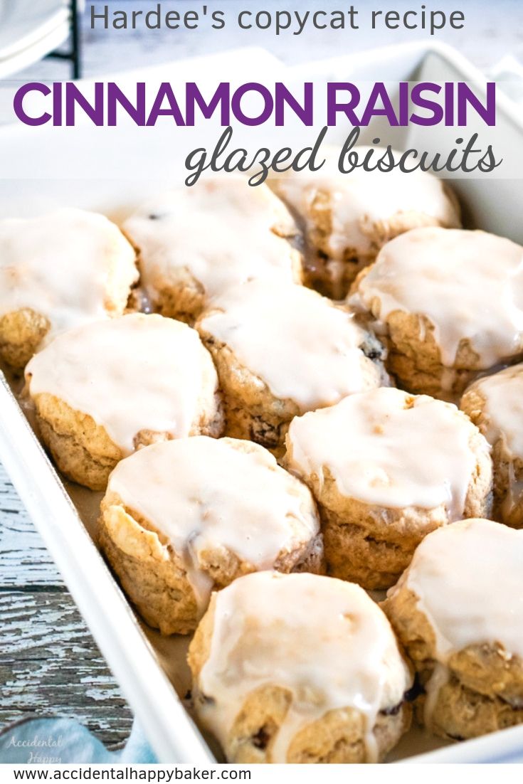 Cinnamon raisin biscuits full of plump raisins and topped with a creamy vanilla glaze taste just like those famous fast food biscuits you remember. #cinnamonraisin #cinnamonraisinbiscuits #glazedbiscuits #Hardeescopycat