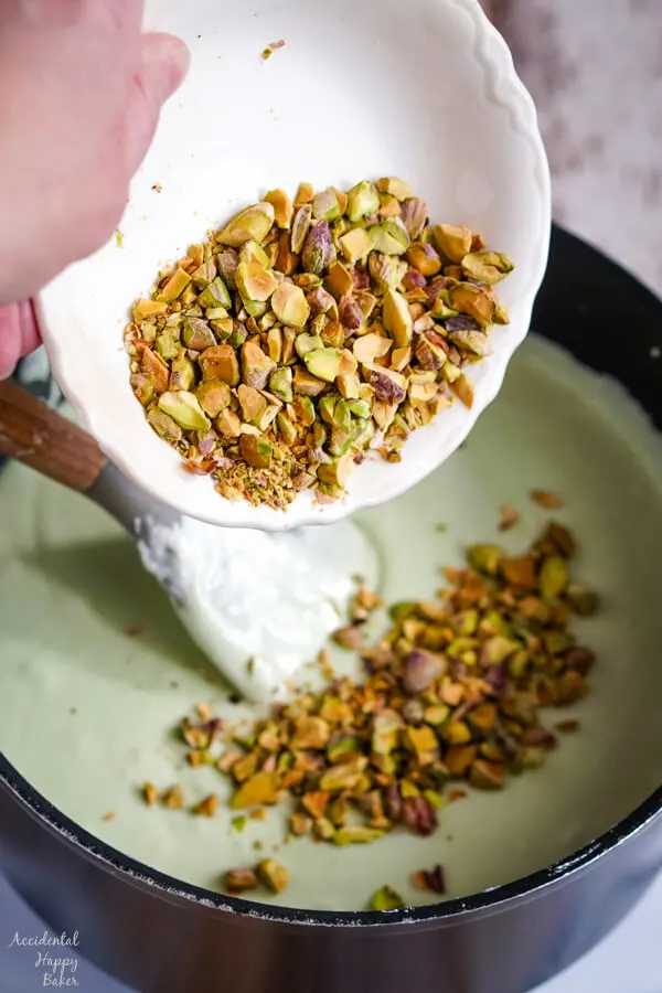 Chopped pistachios are added to the fudge base. 