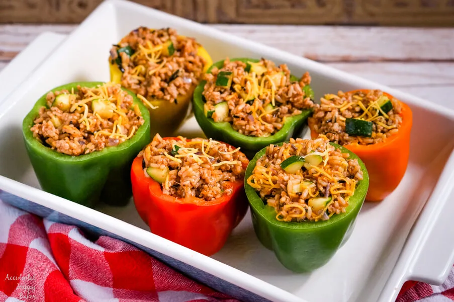  Wild rice stuffed bell peppers take wild rice mix, sausage, bell peppers and veggies and turn it into a colorful and fresh main dish. #stuffedbellpeppers #wildrice #maindishrecipe #accidentalhappybaker
