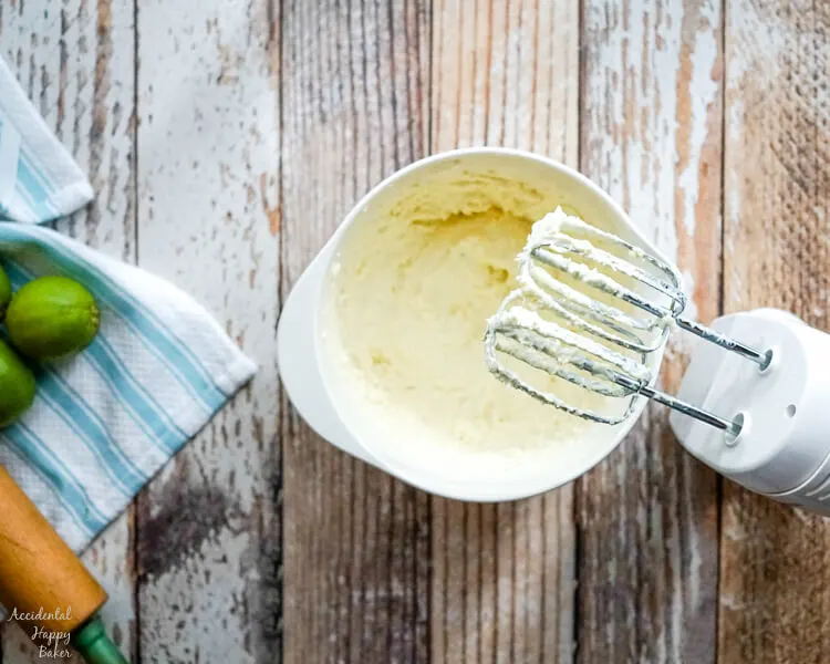 Butter and cream cheese are whipped together as the first step in Key Lime Pie Shortbread Cookies. 