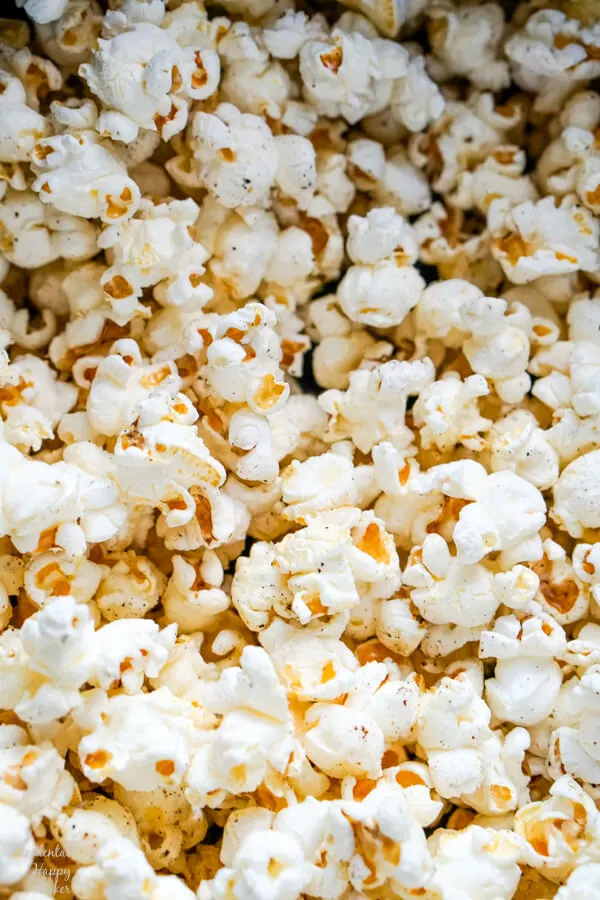 A close up image of the finished popcorn that shows the textures and seasonings. 