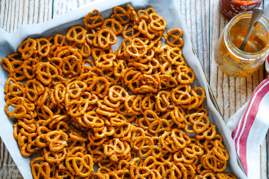 The pretzels are spread out on a baking tray.