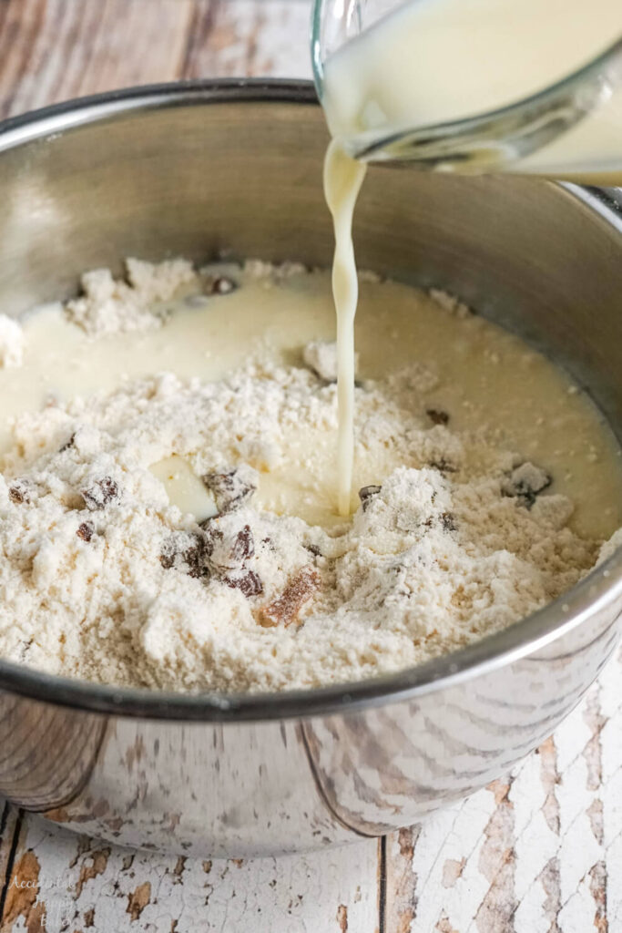 Milk, egg, and vanilla are poured over the top of the dry ingredients.
