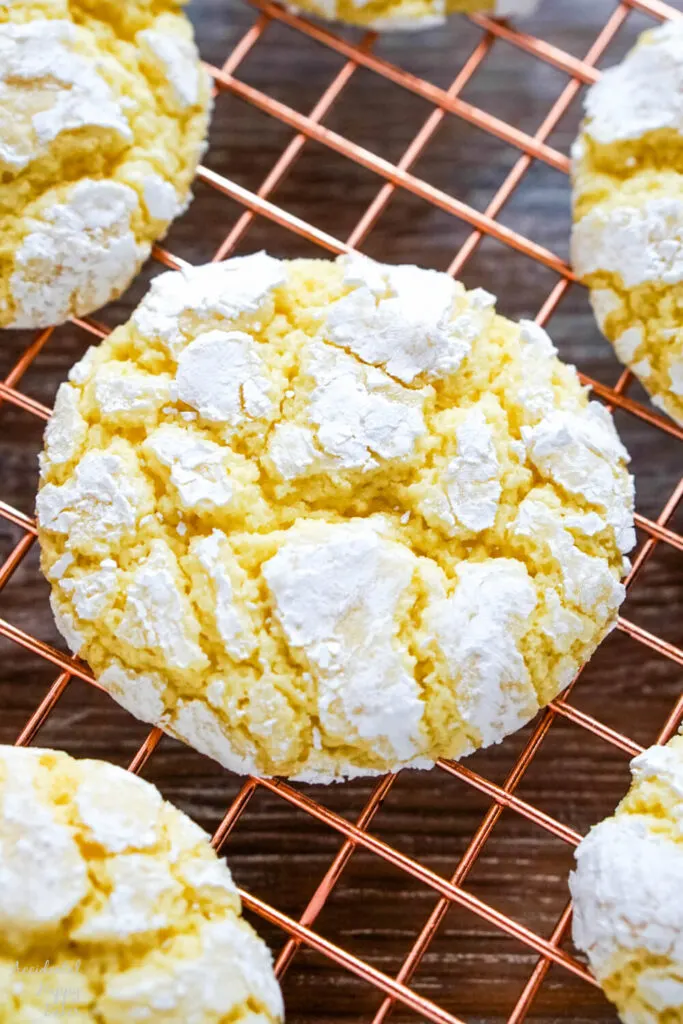 A close up image showing the texture of the lemon crinkle cookies after baking. 