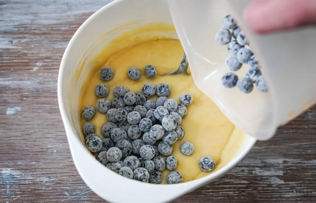 Blueberries are coated with flour first before being folded into the quick bread batter. 