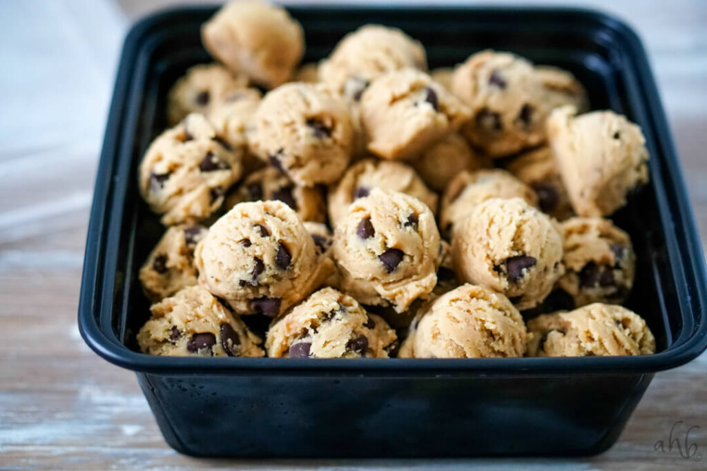 A freezer container of chocolate chip cookie dough ready to be labeled and  frozen. 