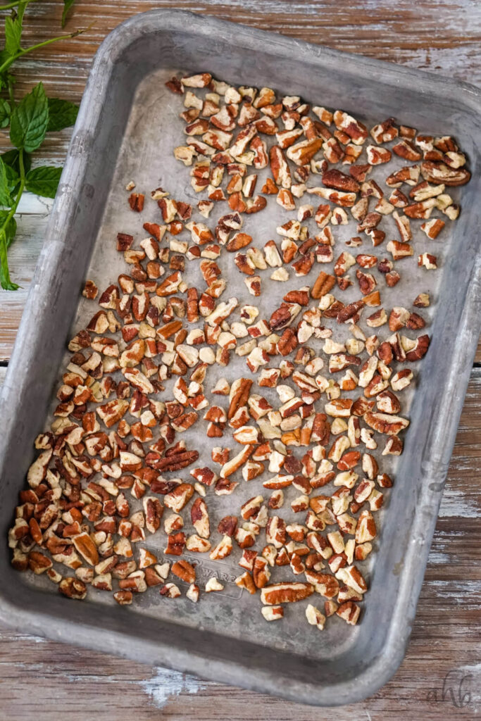 A small sheet pan of toasted pecans. 