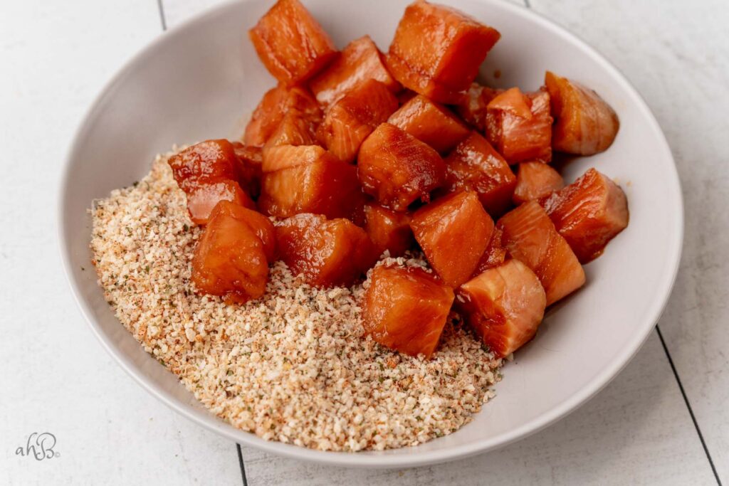 the salmon bites are coated in the breadcrumb mixture.
